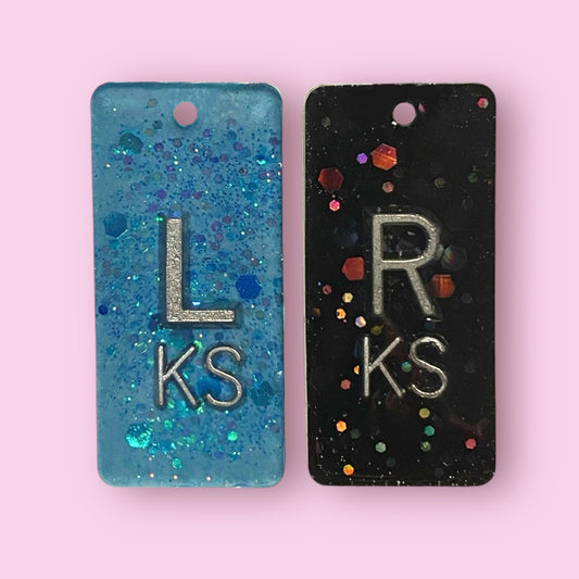 Blue and Black glitter X-Ray markers with initials