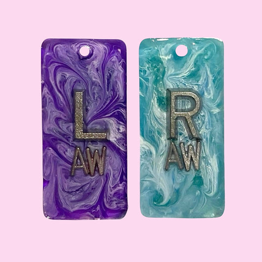 Purple and blue marble style X-Ray markers with initials