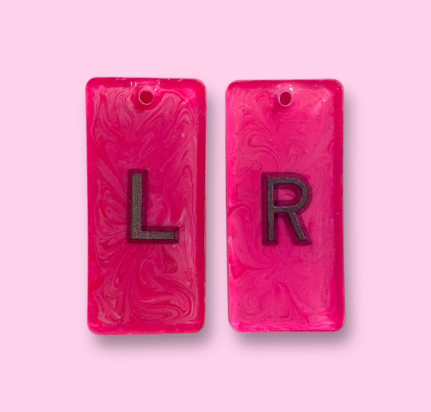 Bright pink marble style X-Ray markers