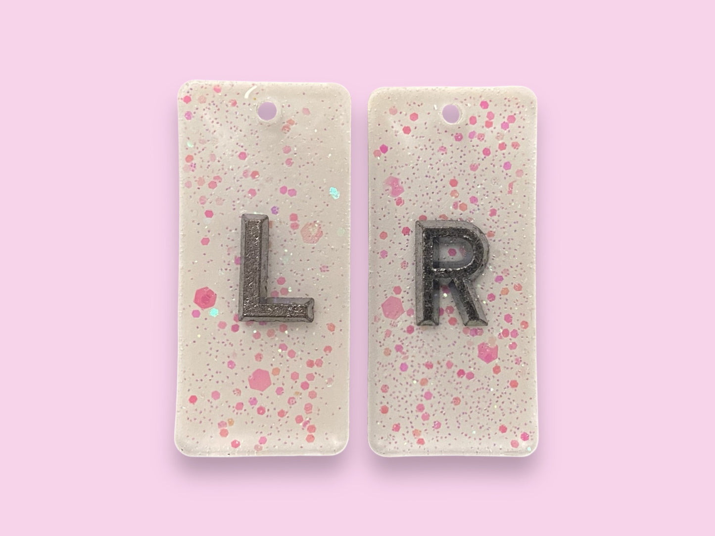 White and pink glitter X-Ray markers